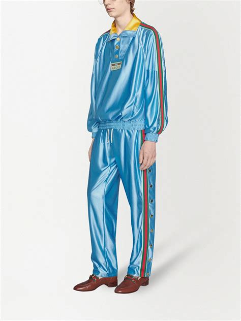 gucci high waist shiny flared pants|Gucci knitted track pants.